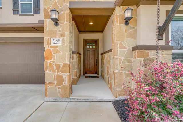 22806 Rio Salado, San Antonio, TX 78261 - entrance to property featuring stone siding and an attached garage