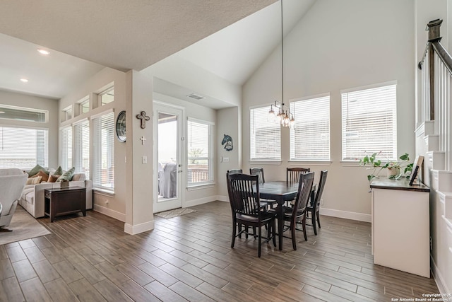 22806 Rio Salado, San Antonio, TX 78261 - dining space with wood finished floors, recessed lighting, a chandelier, and high vaulted ceiling