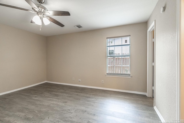 3613 Candleridge, San Antonio, TX 78244 - unfurnished room with wood finished floors, ceiling fan, and baseboards
