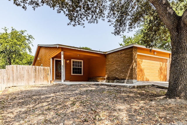 3613 Candleridge, San Antonio, TX 78244 - view of front facade with a garage