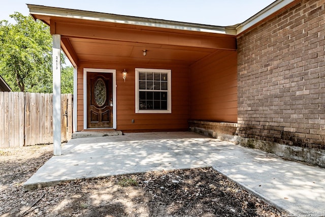 3613 Candleridge, San Antonio, TX 78244 - doorway to property featuring brick siding