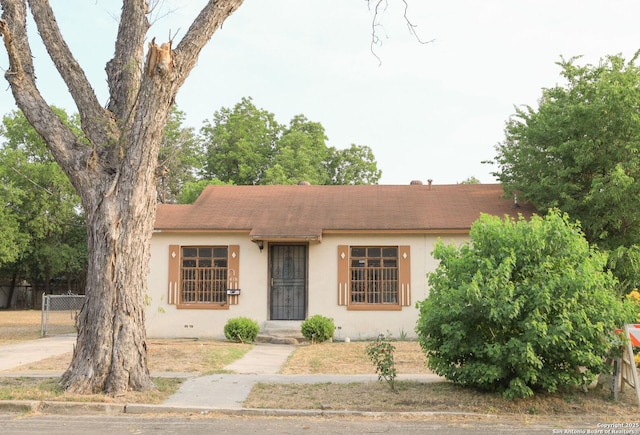 418 Cavalier, San Antonio, TX 78225 - view of front of property featuring stucco siding and a shingled roof