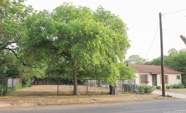 418 Cavalier, San Antonio, TX 78225 - view of property hidden behind natural elements with stucco siding