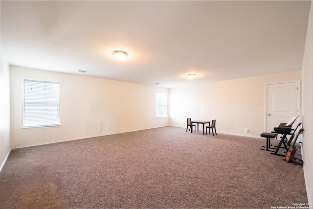 7207 Independence Way, San Antonio, TX 78223 - spare room featuring carpet flooring and baseboards