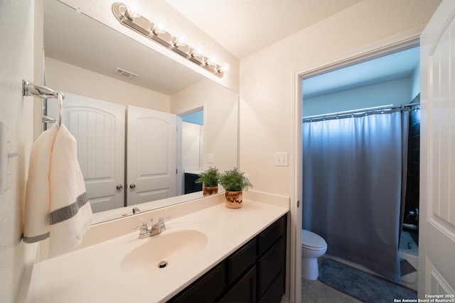 7207 Independence Way, San Antonio, TX 78223 - bathroom featuring vanity, toilet, and shower / tub combo with curtain
