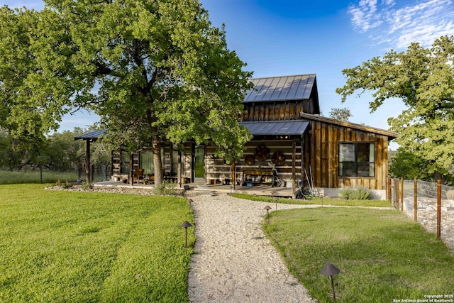 159 Inspiration, Fredericksburg, TX 78624 - view of front of home with a standing seam roof, board and batten siding, and metal roof