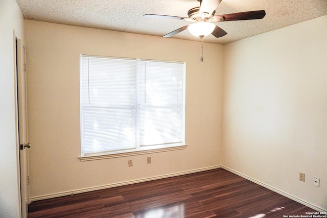 189 Meadowland, Universal City, TX 78148 - unfurnished room with dark wood-style floors, a ceiling fan, a textured ceiling, and baseboards