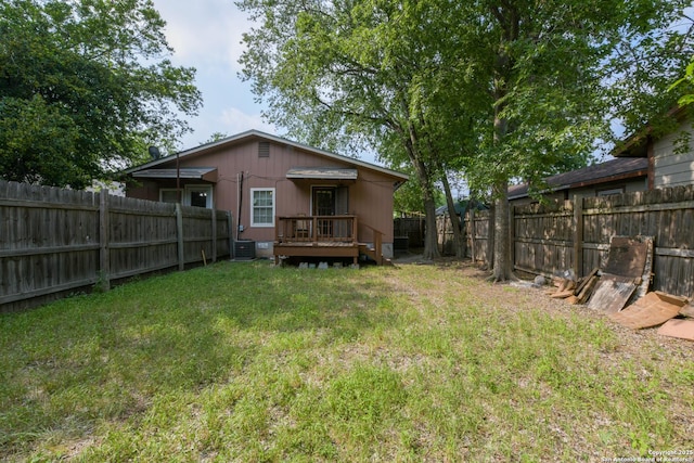 325 Sims, San Antonio, TX 78225 - rear view of house featuring a deck and central air condition unit