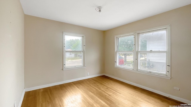 310 Merry Ann, San Antonio, TX 78223 - unfurnished room with light wood-style floors and baseboards