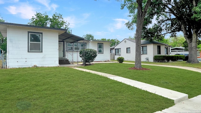 310 Merry Ann, San Antonio, TX 78223 - view of front facade featuring a front lawn and entry steps