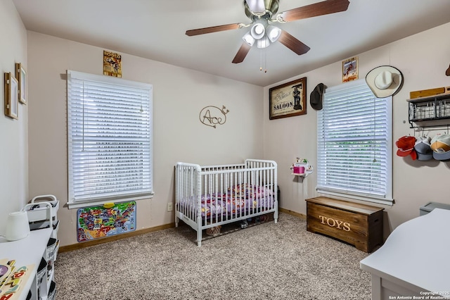 258 S Live Oak, New Braunfels, TX 78130 - bedroom featuring a nursery area, multiple windows, carpet flooring, and baseboards