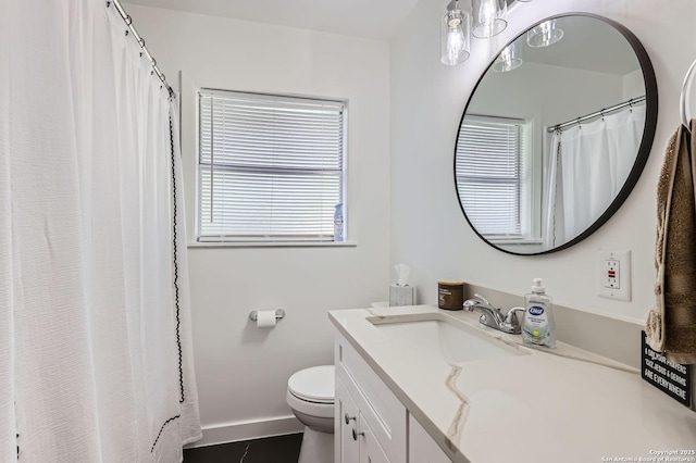 258 S Live Oak, New Braunfels, TX 78130 - bathroom with vanity, toilet, baseboards, and tile patterned floors