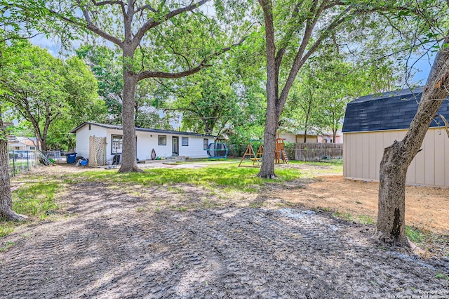258 S Live Oak, New Braunfels, TX 78130 - view of yard featuring a playground