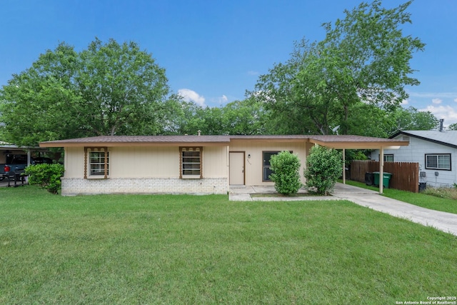 4863 Castle Shield, San Antonio, TX 78218 - single story home featuring an attached carport, concrete driveway, and brick siding