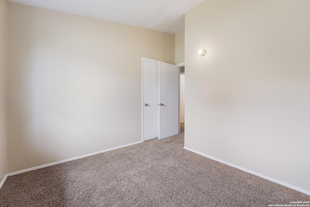 4863 Castle Shield, San Antonio, TX 78218 - carpeted spare room featuring baseboards