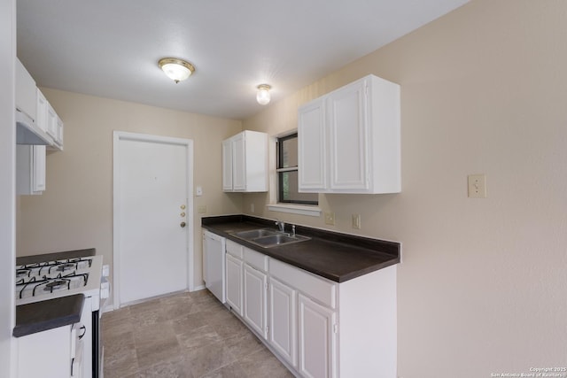 4863 Castle Shield, San Antonio, TX 78218 - kitchen featuring dark countertops, a sink, white appliances, and white cabinetry