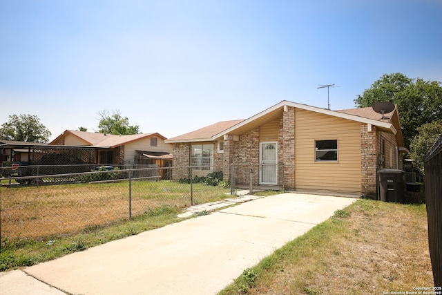 3258 Twining, San Antonio, TX 78211 - view of front of property with brick siding and concrete driveway