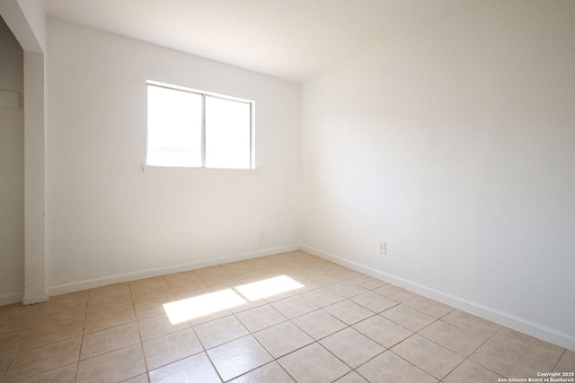 3258 Twining, San Antonio, TX 78211 - unfurnished room with light tile patterned floors and baseboards