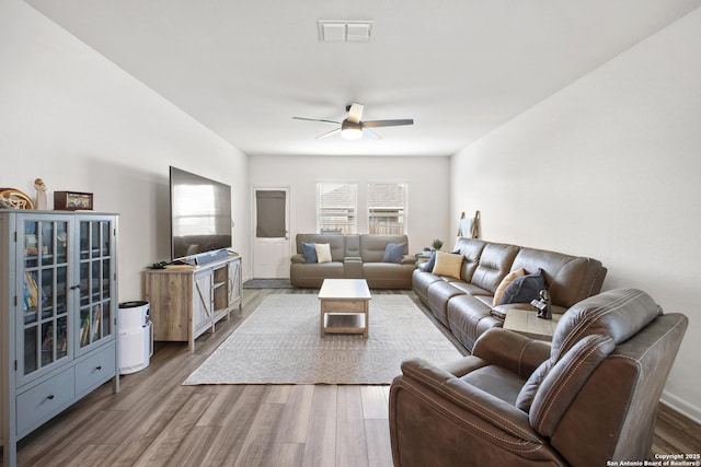 12855 Cygnus, San Antonio, TX 78245 - living area with ceiling fan and wood finished floors