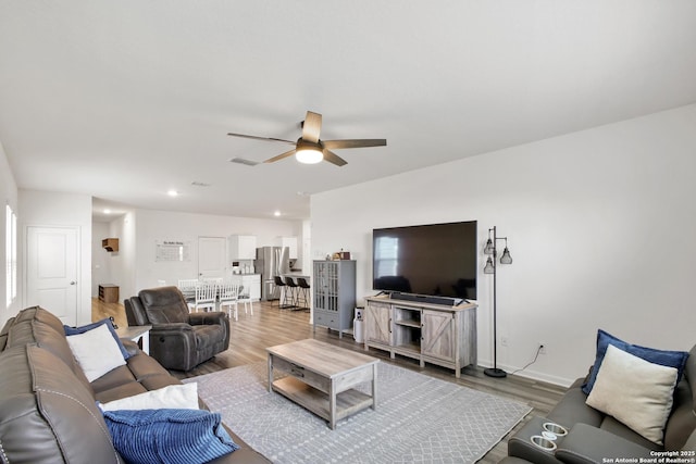 12855 Cygnus, San Antonio, TX 78245 - living area with a ceiling fan, light wood-style floors, and recessed lighting