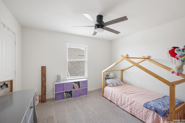 12855 Cygnus, San Antonio, TX 78245 - bedroom featuring light colored carpet, a ceiling fan, and baseboards