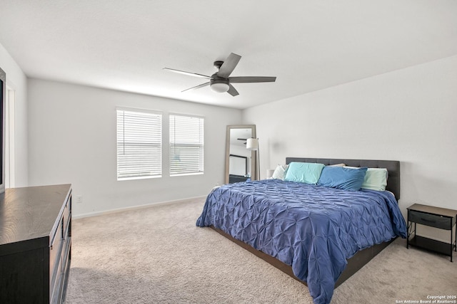 12855 Cygnus, San Antonio, TX 78245 - bedroom featuring light colored carpet, a ceiling fan, and baseboards