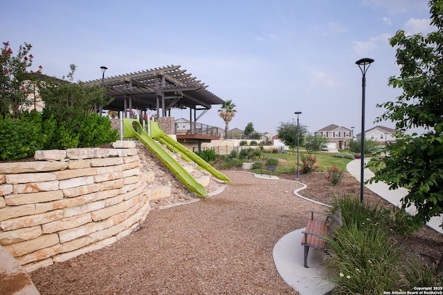 12855 Cygnus, San Antonio, TX 78245 - view of play area with a pergola and a residential view