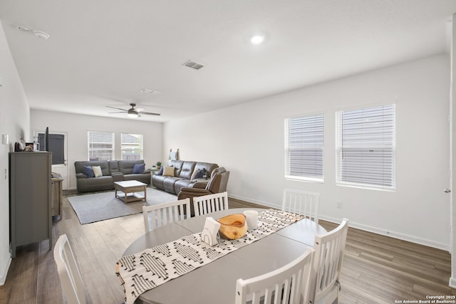 12855 Cygnus, San Antonio, TX 78245 - dining space featuring wood finished floors, a ceiling fan, and baseboards