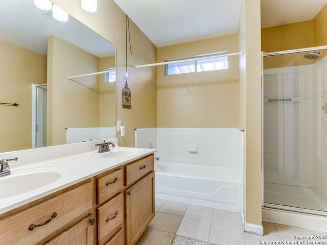 14342 Markham Ln, San Antonio, TX 78247 - full bathroom with a shower stall, a bath, double vanity, and tile patterned flooring