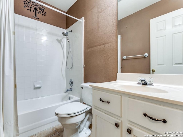 14342 Markham Ln, San Antonio, TX 78247 - full bath featuring shower / bath combo with shower curtain, toilet, vanity, a textured wall, and tile patterned floors