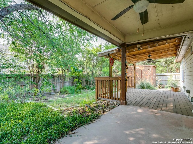 14342 Markham Ln, San Antonio, TX 78247 - wooden terrace with a ceiling fan, a fenced backyard, and a patio