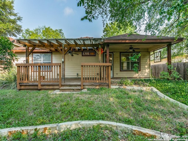 14342 Markham Ln, San Antonio, TX 78247 - back of property with a ceiling fan, a wooden deck, and a pergola