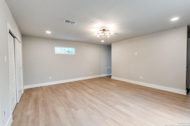 1071 Diamondhead Dr, Canyon Lake, TX 78133 - basement featuring light wood finished floors, recessed lighting, and baseboards