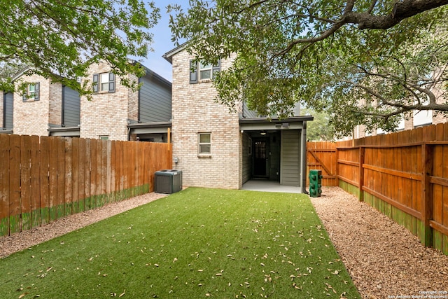 2718 Old Field Dr Unit 101, San Antonio, TX 78247 - back of house with brick siding and central AC unit