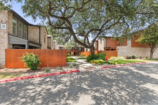 2718 Old Field Dr Unit 101, San Antonio, TX 78247 - view of side of home with brick siding