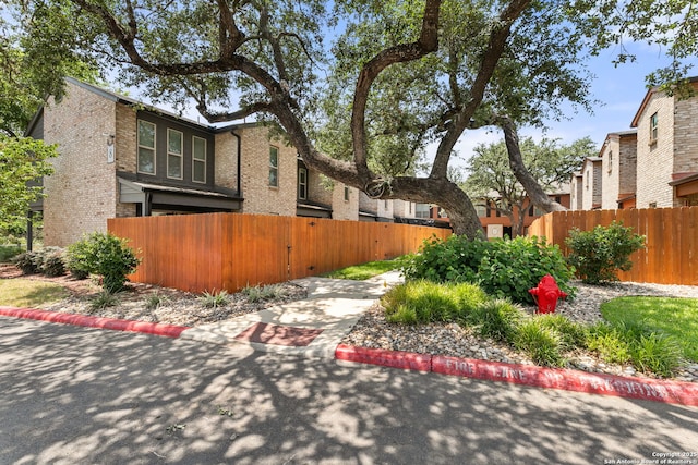 2718 Old Field Dr Unit 101, San Antonio, TX 78247 - view of side of home featuring brick siding