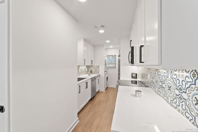 2718 Old Field Dr Unit 101, San Antonio, TX 78247 - kitchen with light countertops, white cabinets, and recessed lighting
