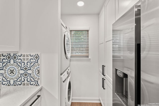 2718 Old Field Dr Unit 101, San Antonio, TX 78247 - bathroom with stacked washer / dryer, vanity, and recessed lighting