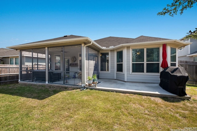 2415 Olive Way, San Antonio, TX 78259 - rear view of house with a sunroom, a patio area, and roof with shingles