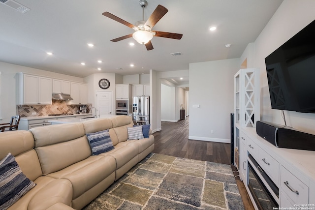 2415 Olive Way, San Antonio, TX 78259 - living room with a ceiling fan, dark wood-style flooring, recessed lighting, and baseboards