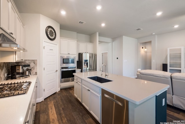 2415 Olive Way, San Antonio, TX 78259 - kitchen with a sink, stainless steel appliances, dark wood-style flooring, tasteful backsplash, and recessed lighting