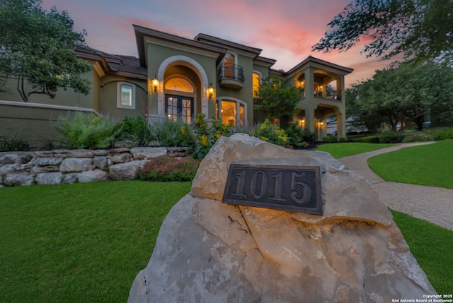 1015 Campanile, San Antonio, TX 78258 - mediterranean / spanish-style home featuring a lawn, french doors, and stucco siding