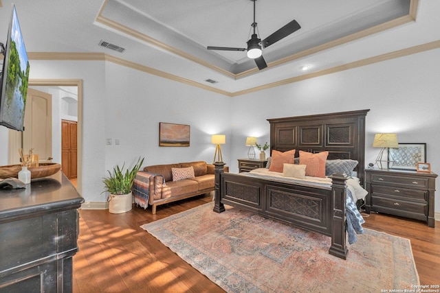 1015 Campanile, San Antonio, TX 78258 - bedroom with a tray ceiling, wood finished floors, crown molding, baseboards, and a ceiling fan