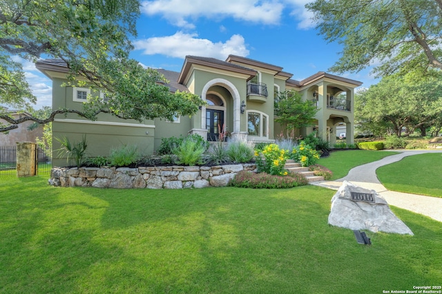 1015 Campanile, San Antonio, TX 78258 - mediterranean / spanish-style house with a balcony, stucco siding, and french doors