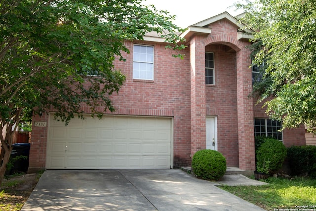 7331 Obbligato Ln, San Antonio, TX 78266 - traditional-style home featuring driveway, brick siding, and an attached garage