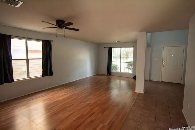 7331 Obbligato Ln, San Antonio, TX 78266 - unfurnished room featuring ceiling fan, wood finished floors, and baseboards