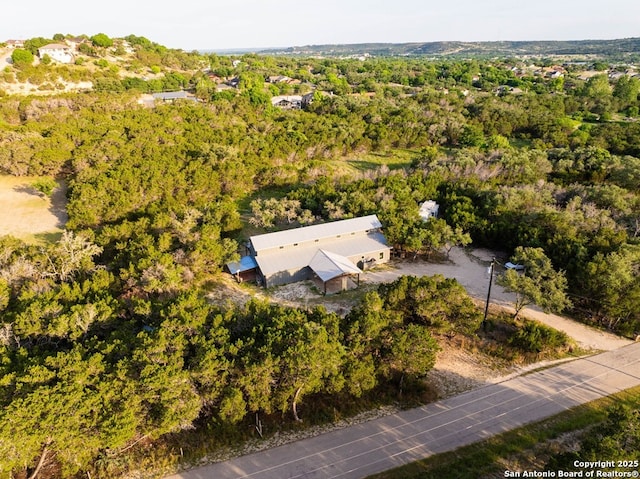231 Doris Dr, Kerrville, TX 78028 - aerial view of property and surrounding area featuring a forest