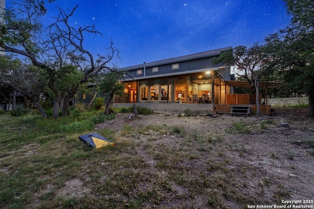 231 Doris Dr, Kerrville, TX 78028 - back of property with board and batten siding