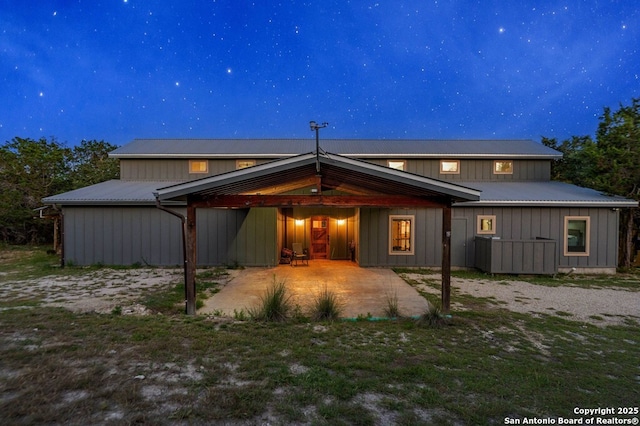 231 Doris Dr, Kerrville, TX 78028 - rear view of house featuring a patio area and metal roof