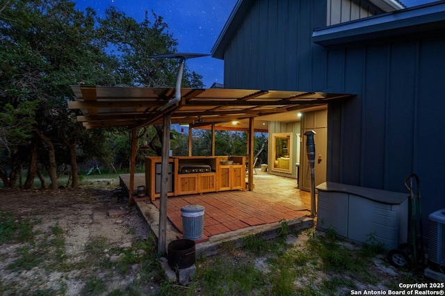 231 Doris Dr, Kerrville, TX 78028 - wooden deck with a patio